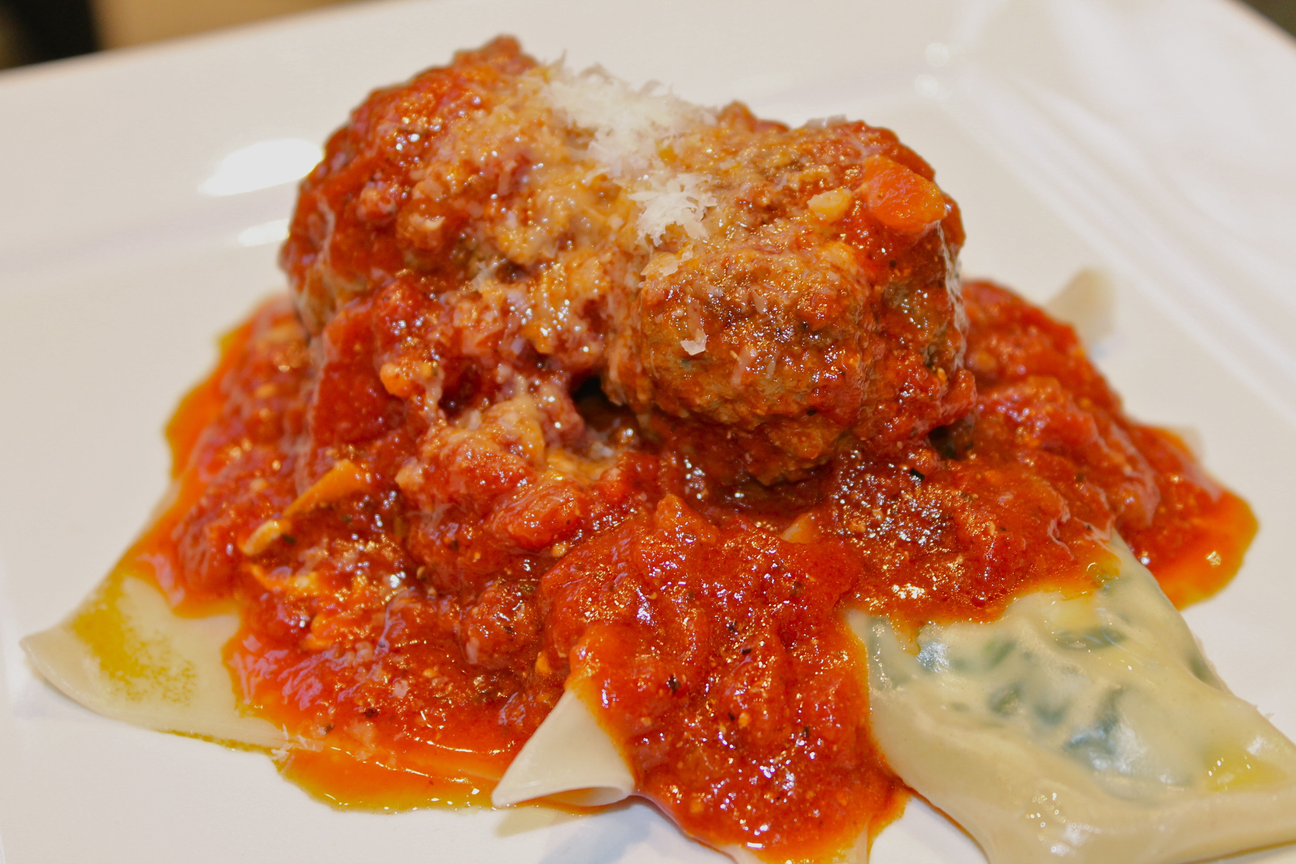 Homemade Spinach Ravioli with Mozzarella Stuffed Meatballs and Marinara