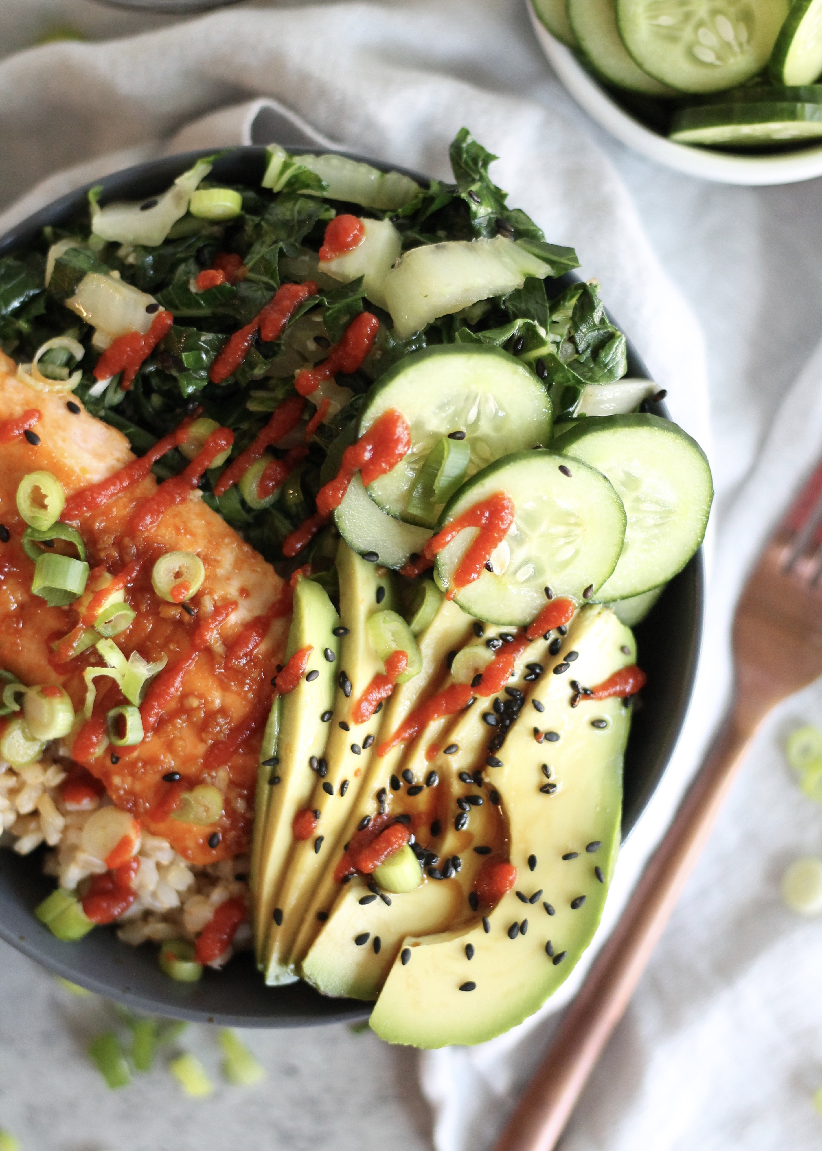 Garlic Sesame Salmon Buddha Bowls with Bok Choy, Avocado, and Cucumbers