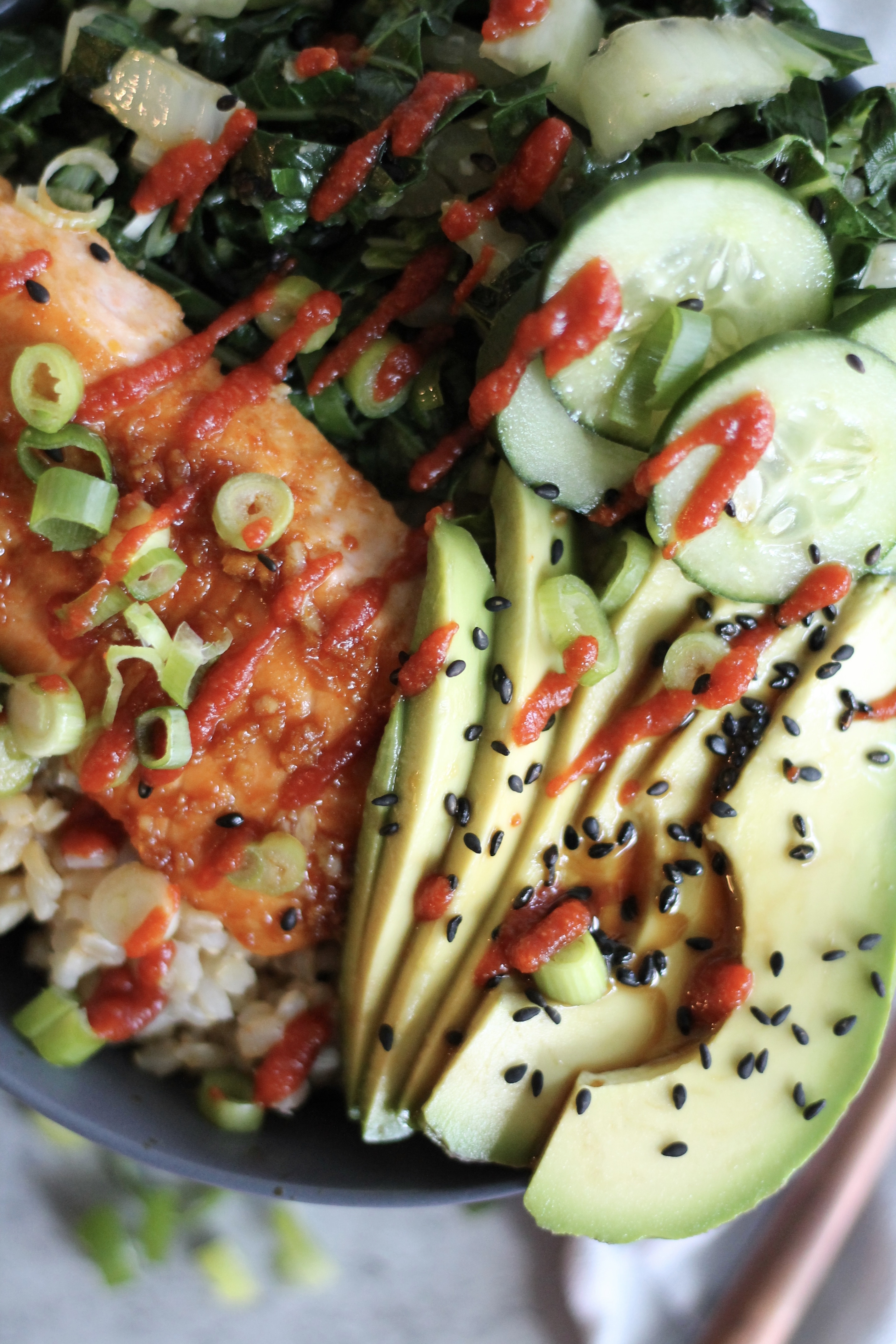 Garlic Sesame Salmon Buddha Bowls with Bok Choy, Avocado, and Cucumbers