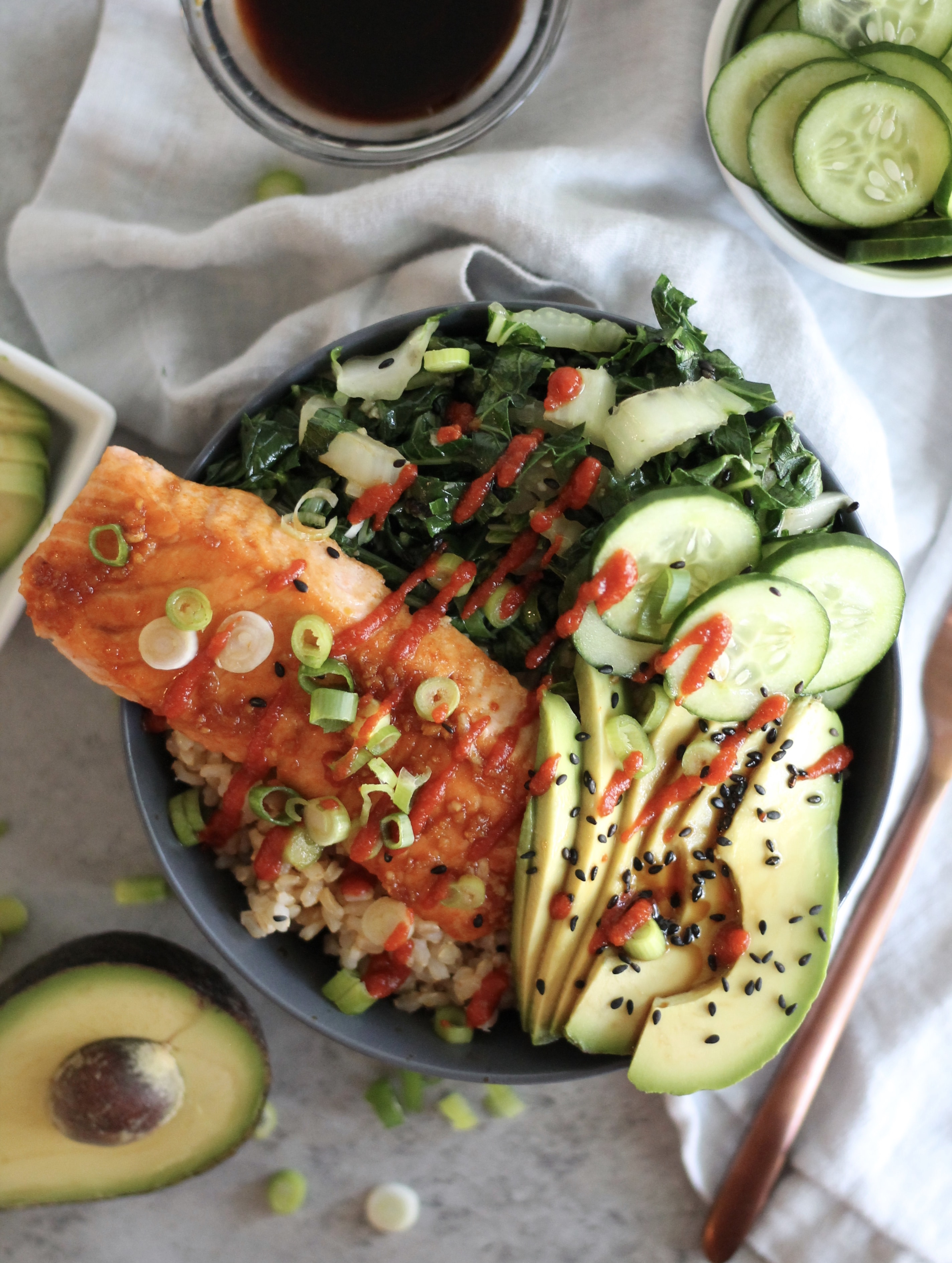 Garlic Sesame Salmon Buddha Bowls with Bok Choy, Avocado, and Cucumbers