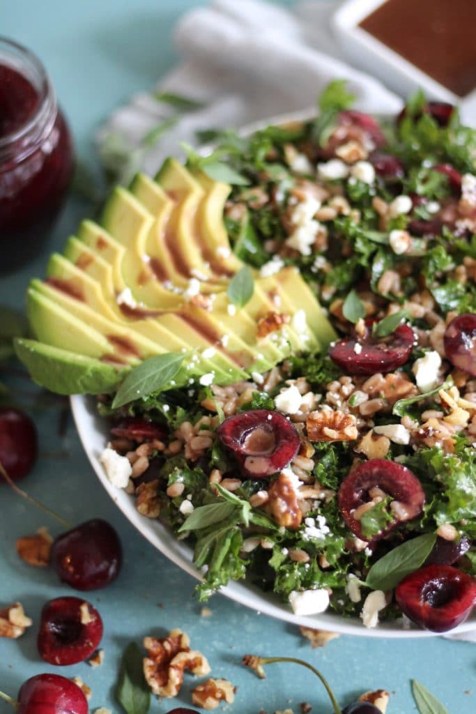 Cherry Kale Salad with Farro, Avocado, Feta, and Cherry Balsamic