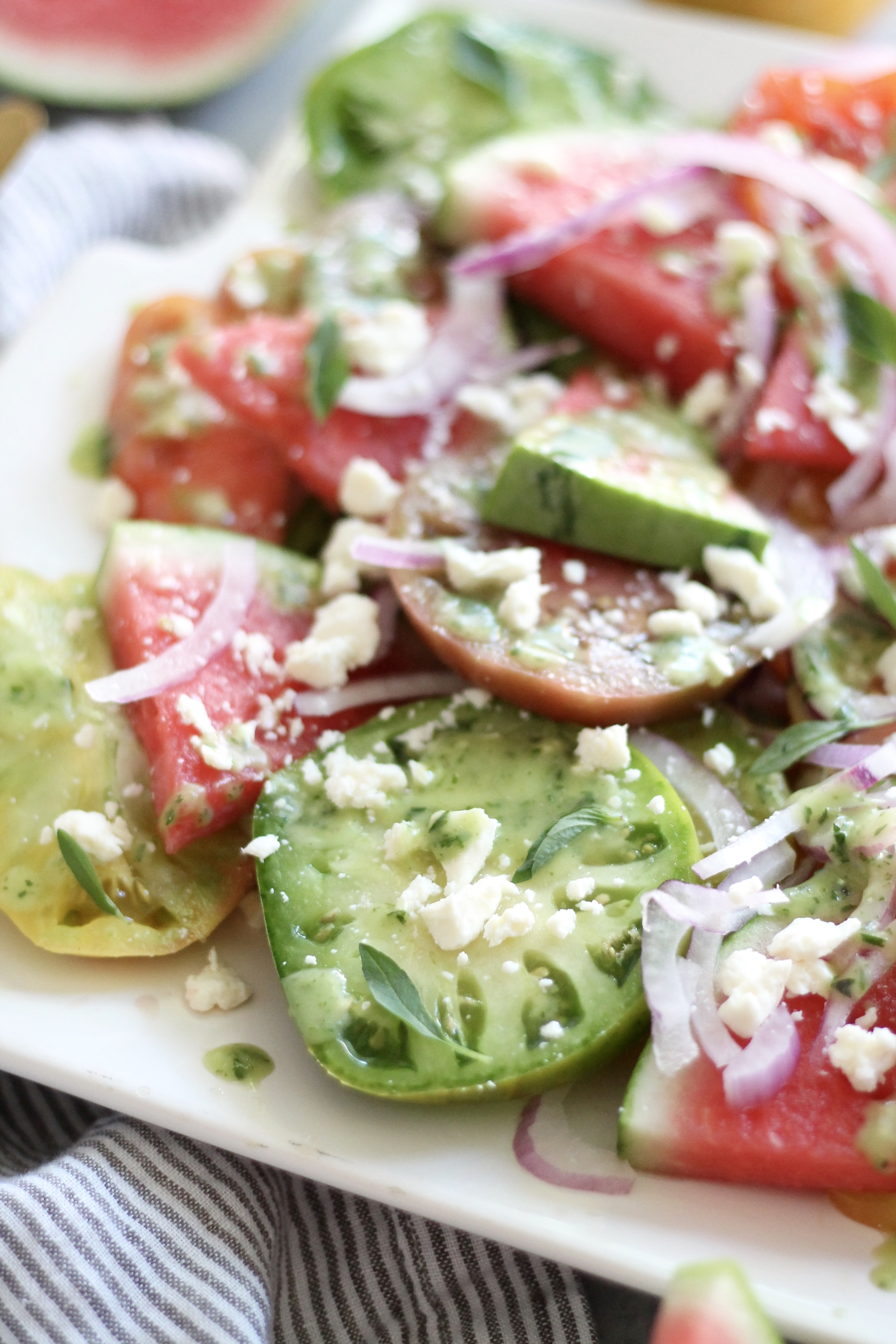 Heirloom Tomato Watermelon Salad with Feta, Red Onion, and Herb Vinaigrette