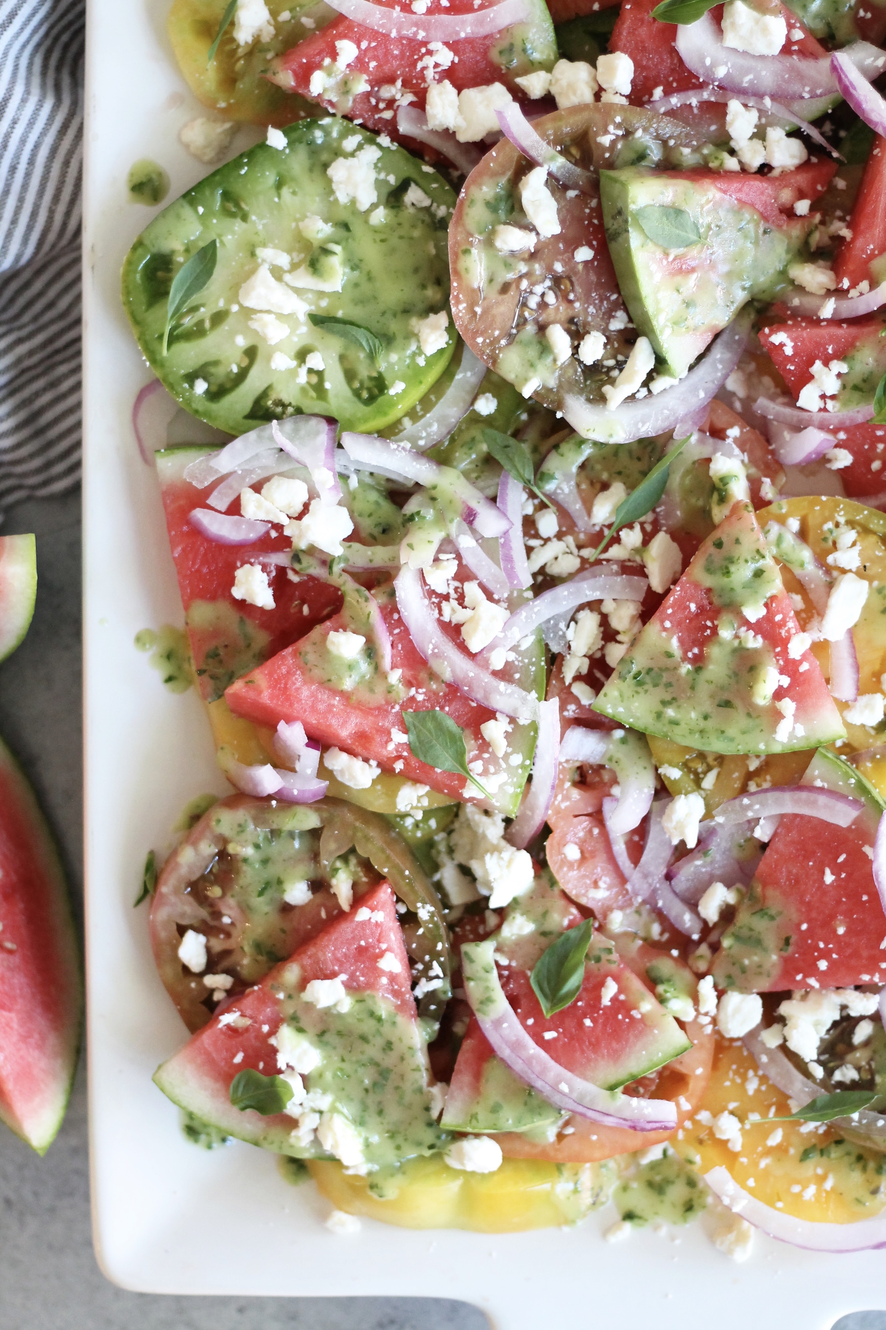 Heirloom Tomato Watermelon Salad with Feta, Red Onion, and Herb Vinaigrette