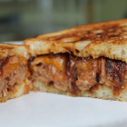 BBQ Pulled Pork Grilled Cheese with Beer Caramelized Onions and Sharp Cheddar