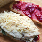Turkey Panini with Cranberry White Cheddar and Crispy Sage