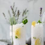 Forward facing shot of 2 lavender mint vodka lemonades