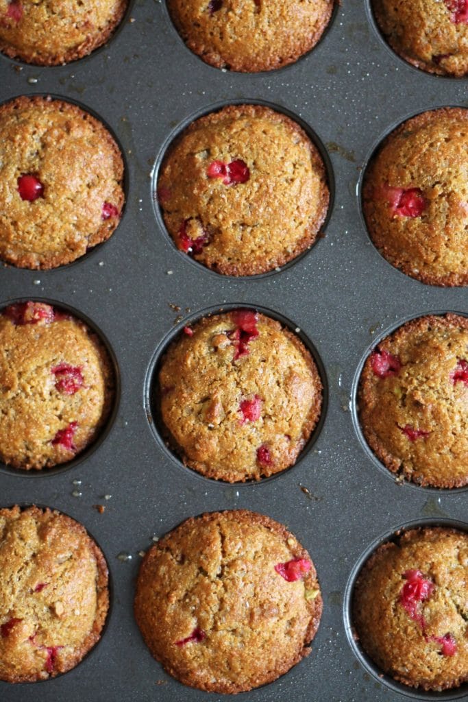 Whole Wheat Cranberry Orange Pistachio Muffins with Vanilla Bean Glaze