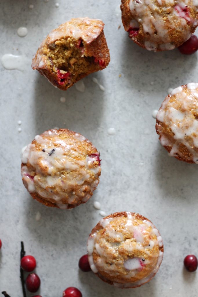 Whole Wheat Cranberry Orange Pistachio Muffins with Vanilla Bean Glaze