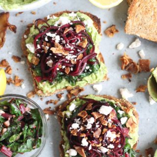 Avocado Toast with Beet Noodles, Garlic Swiss Chard, Bacon, and Feta