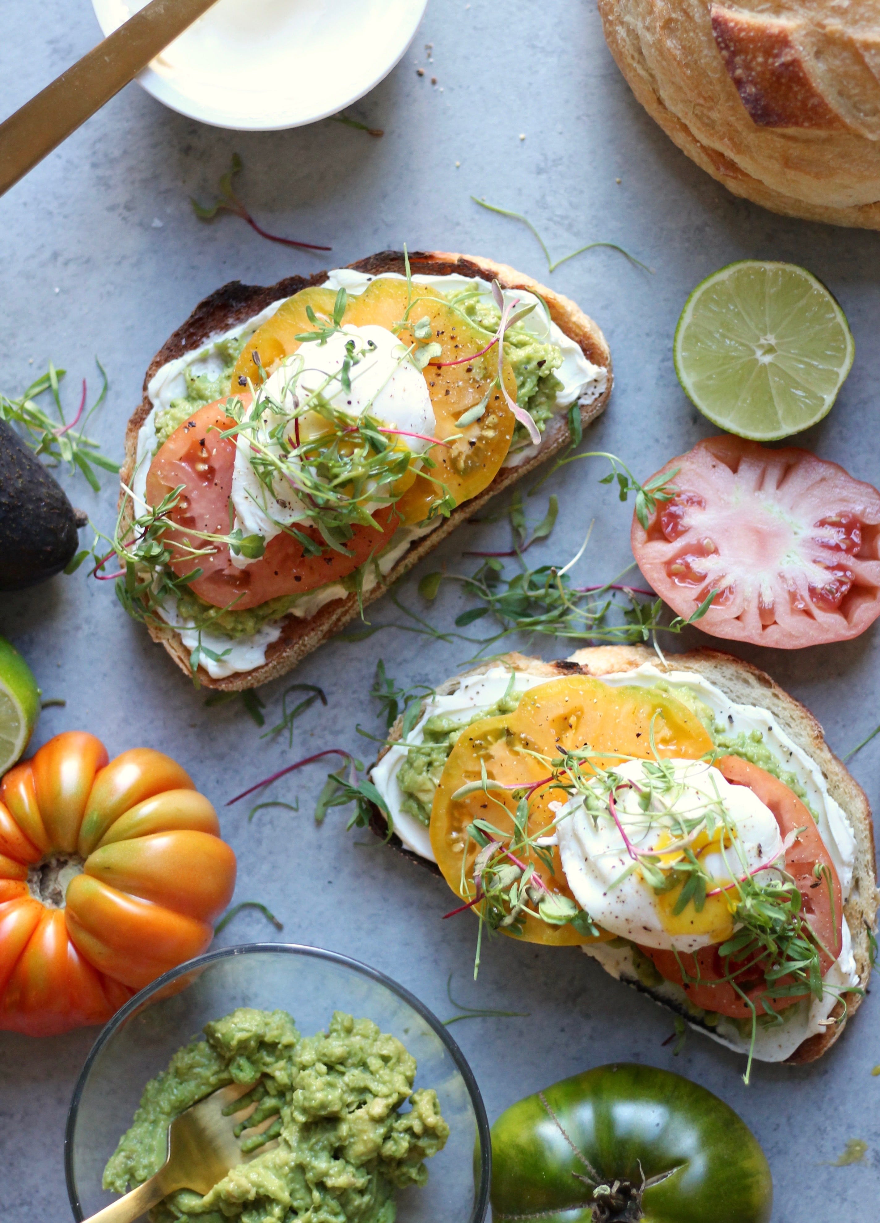 Cream Cheese Avocado Toast with Heirloom Tomatoes and Poached Eggs