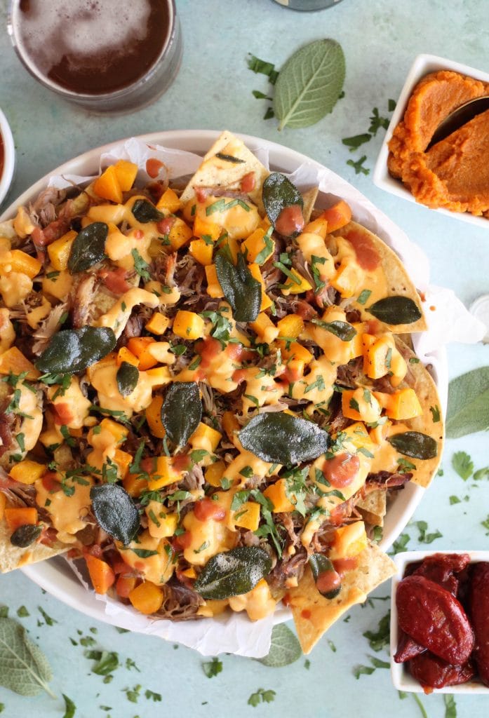Pulled Pork Nachos with Pumpkin Chipotle Queso, Butternut Squash, and Crispy Sage