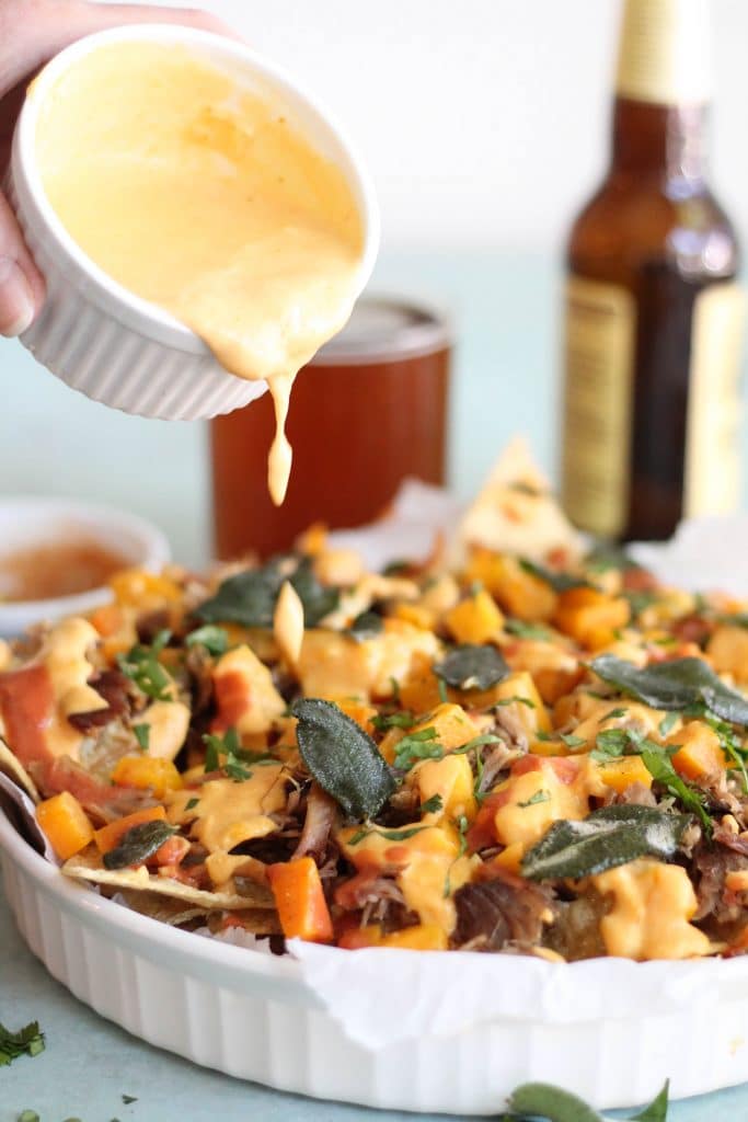 Pulled Pork Nachos with Pumpkin Chipotle Queso, Butternut Squash, and Crispy Sage
