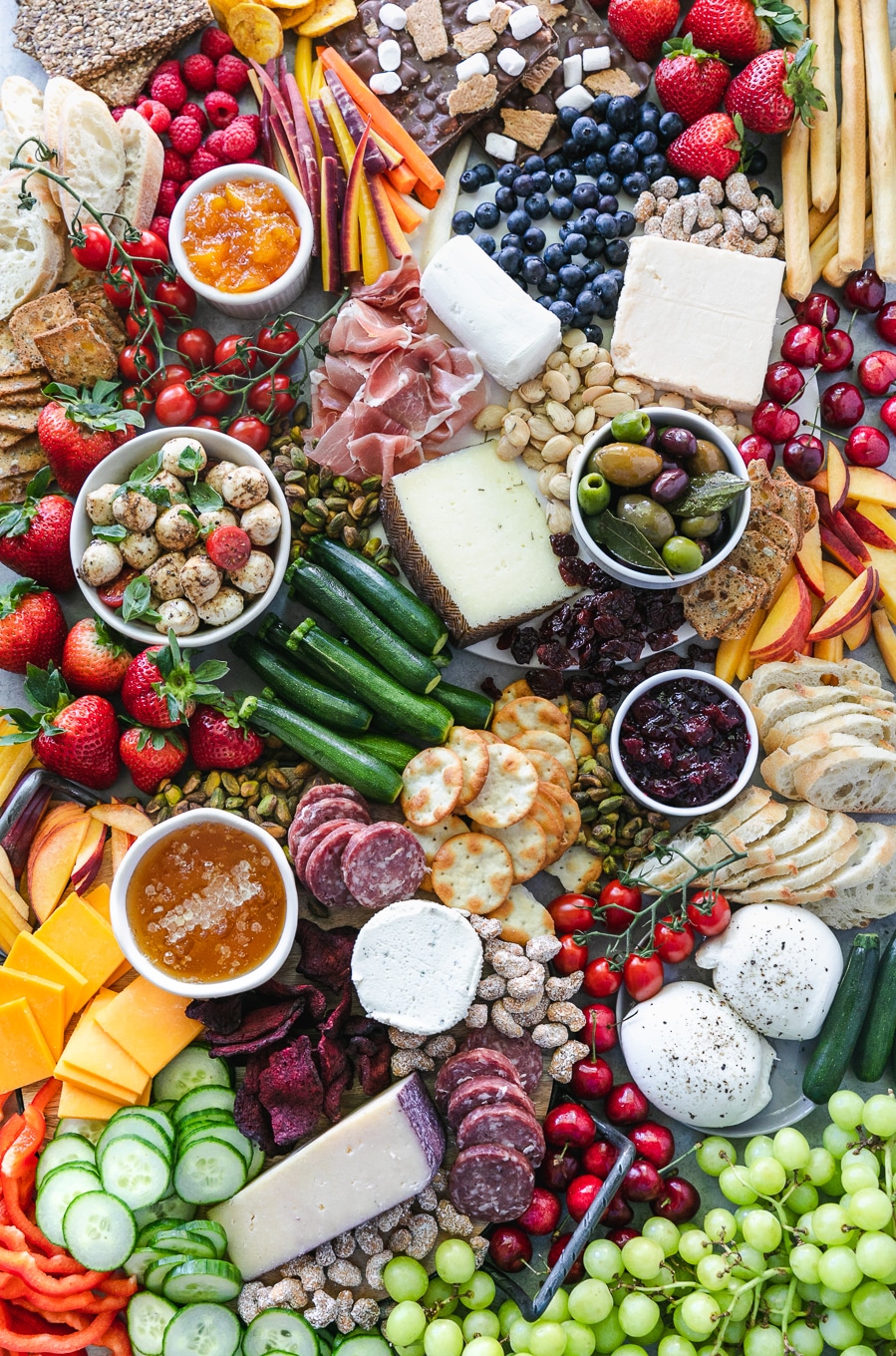 Overhead shot of a colorful summer cheeseboard