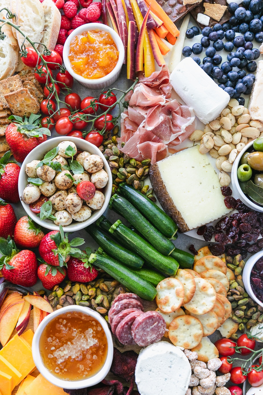 Overhead shot of a colorful summer cheeseboard