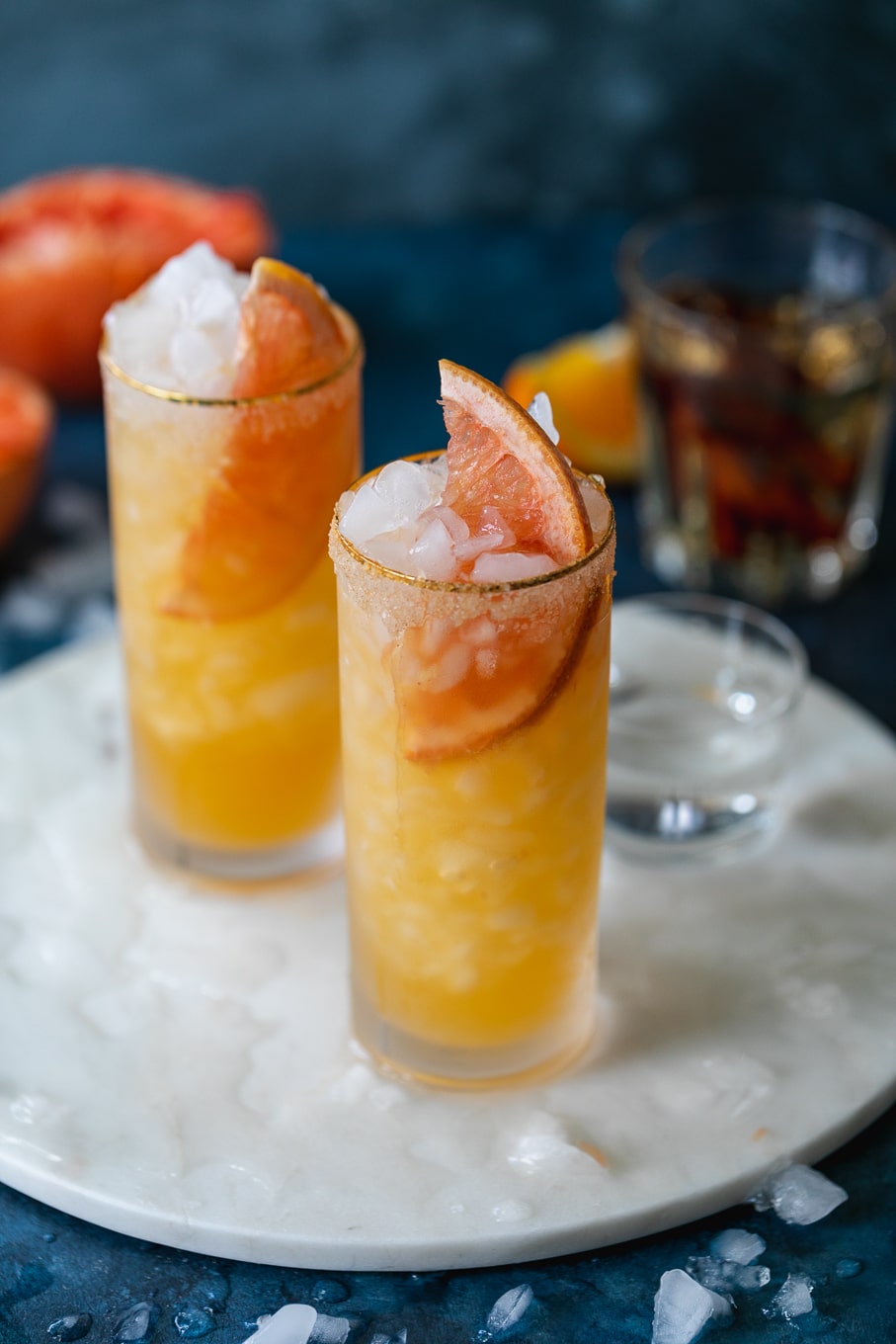 Close up shot of two grapefruit cocktails