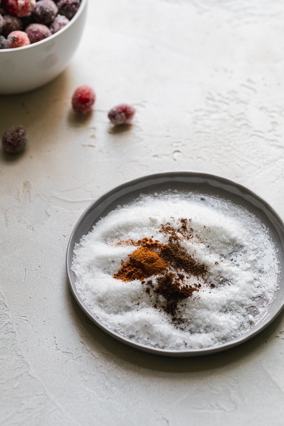 Close up shot of a plate of sugar, salt, and spices