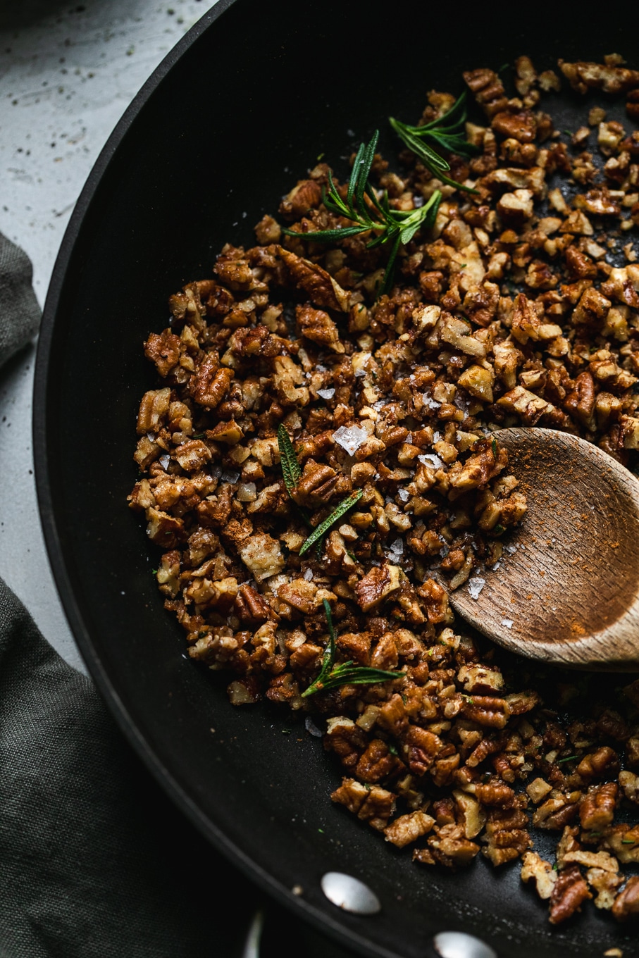 Close up shot of rosemary pecan crunch in a skillet